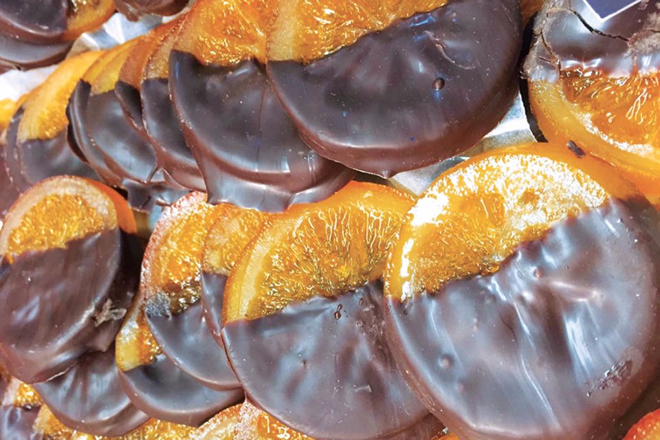 Fette d'arancia candite ricoperte di cioccolato fondente